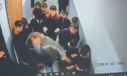 Çocuğuna kar topu atan öğrenciyi darbetti