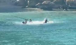 Mersin'de deniz ortasında sopalı kavga