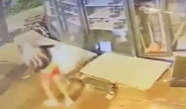 Mini etek giyip peruk takan erkek, mağazadan kilim çaldı