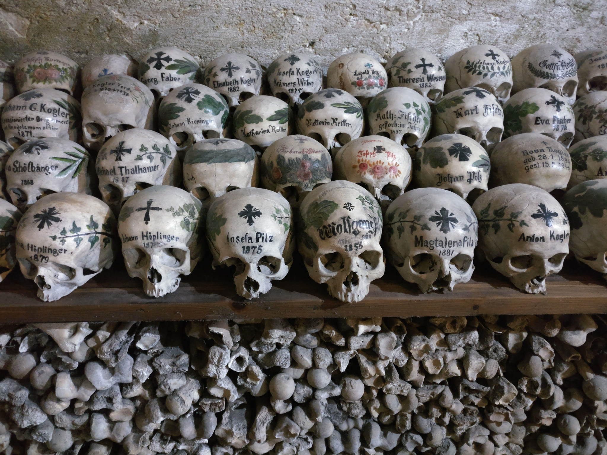 Hallstatt Beinhaus, Where You Can Show Off Your Skull Forever. Painted Skulls ( Totenschädel) And Bones. Beinhaus ('Bone House', Ossuary) Roman Catholic Chapel, Hallstatt, Salzkammergut, Austria 2017