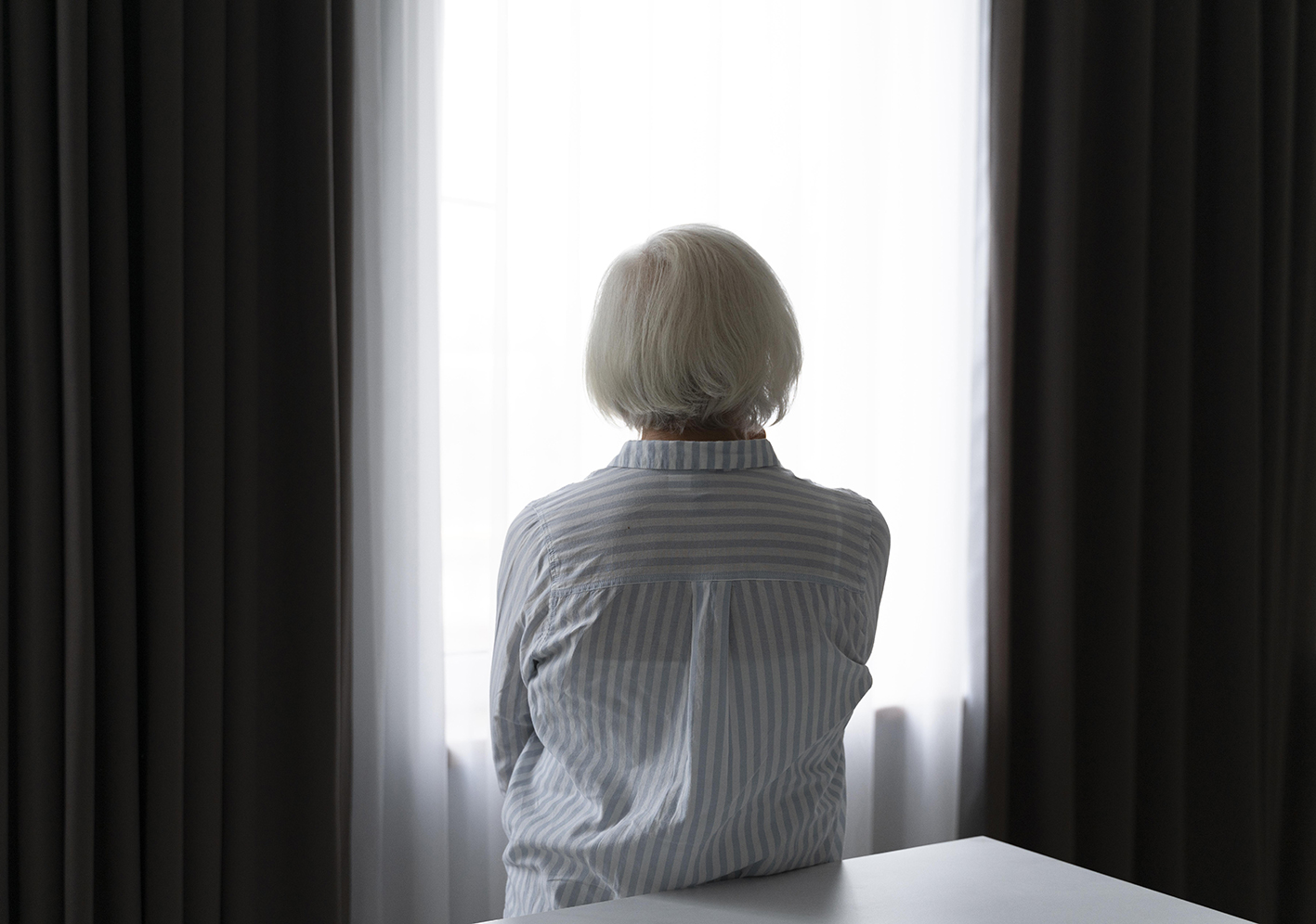 Senior Woman Confronting Alzheimer Disease
